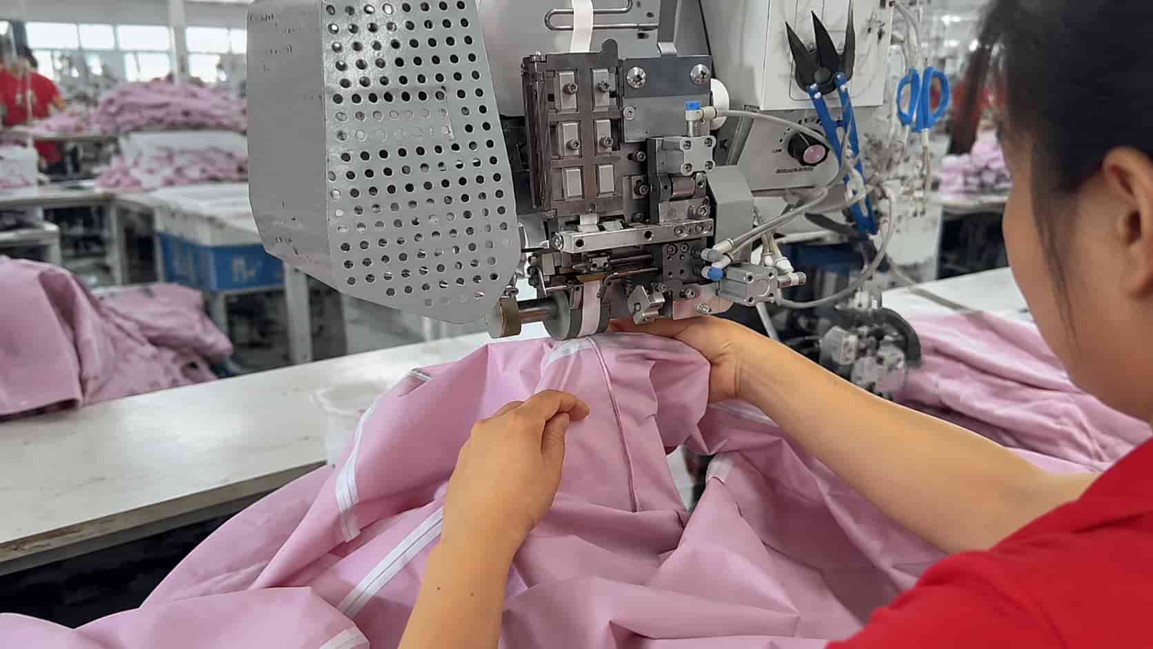 Seam tape on a hardshell jacket during production