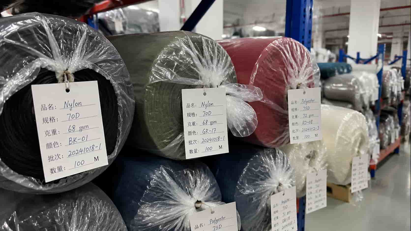 Fabric roll with lot number, GSM and color label at the RUINIU warehouse